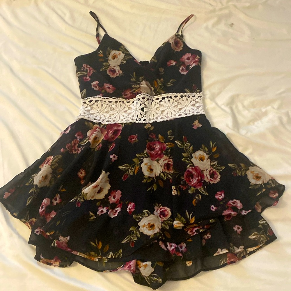 A pretty floral romper with a white design in the middle